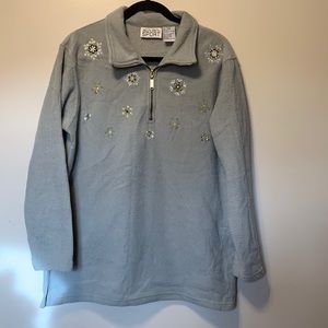 Embordoried snowflakes on fleece type fabric